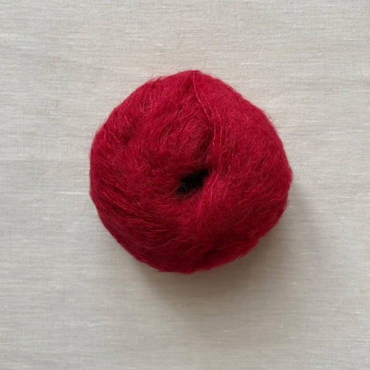 pelote de laine baby suri mérinos et soie à tricoter de la marque fonty, de couleur fraise écrasée