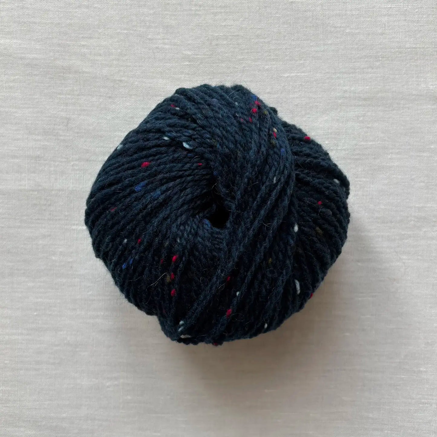 pelote de laine super tweed à tricoter de la marque fonty, de couleur bleu marine