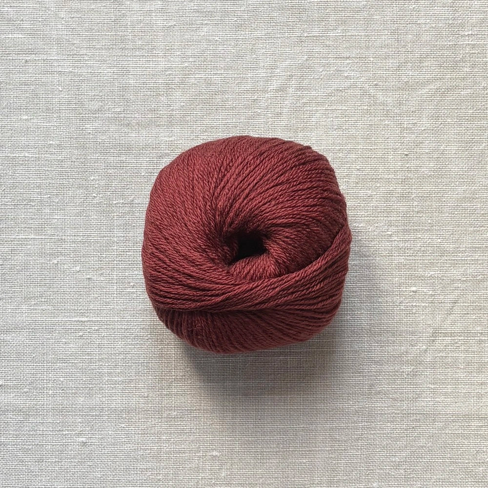 pelote de laine mérinos à tricoter de la marque fonty, de couleur marron auburn