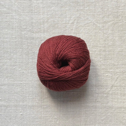 pelote de laine mérinos à tricoter de la marque fonty, de couleur marron auburn