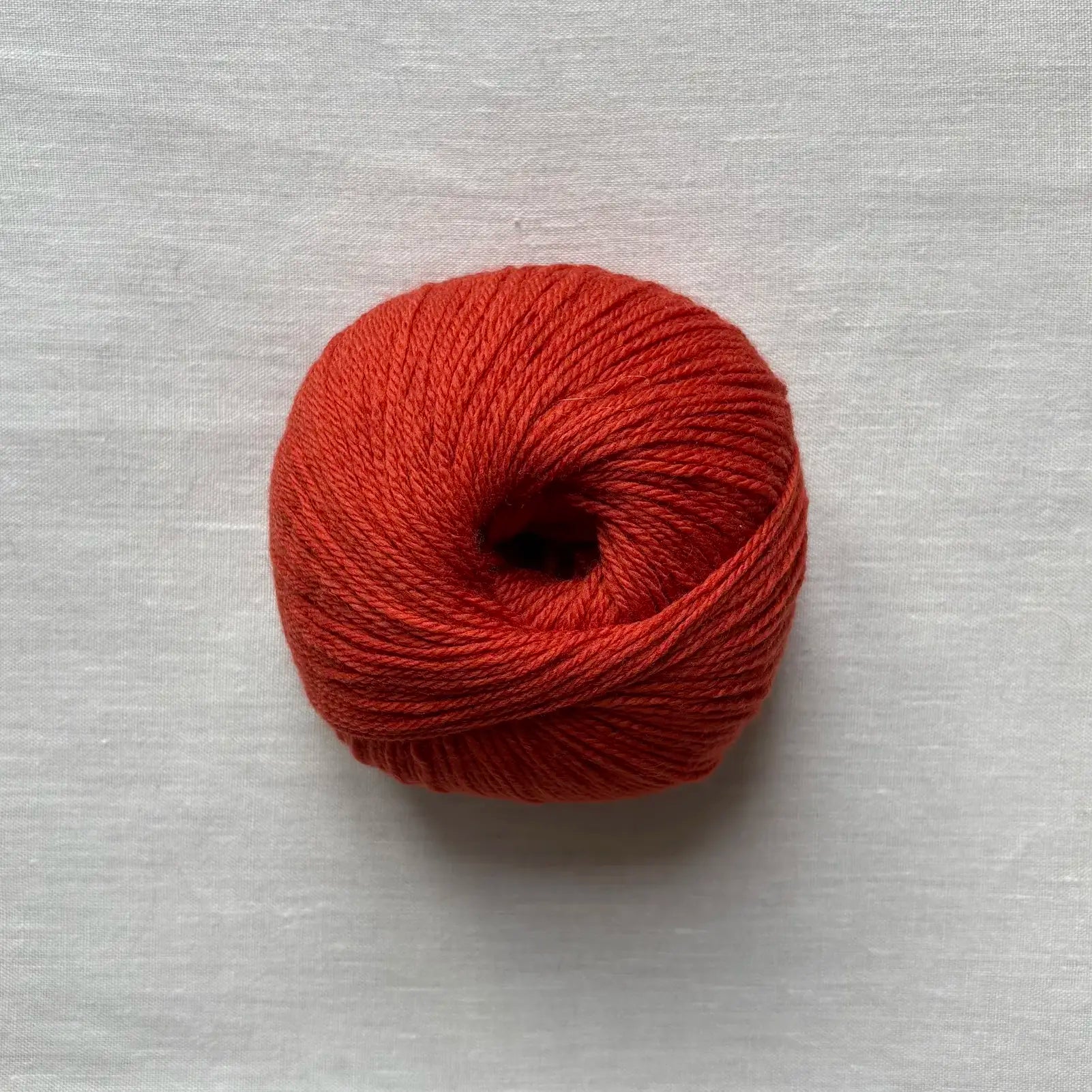 pelote de laine mérinos à tricoter de la marque fonty, de couleur orange brûlé