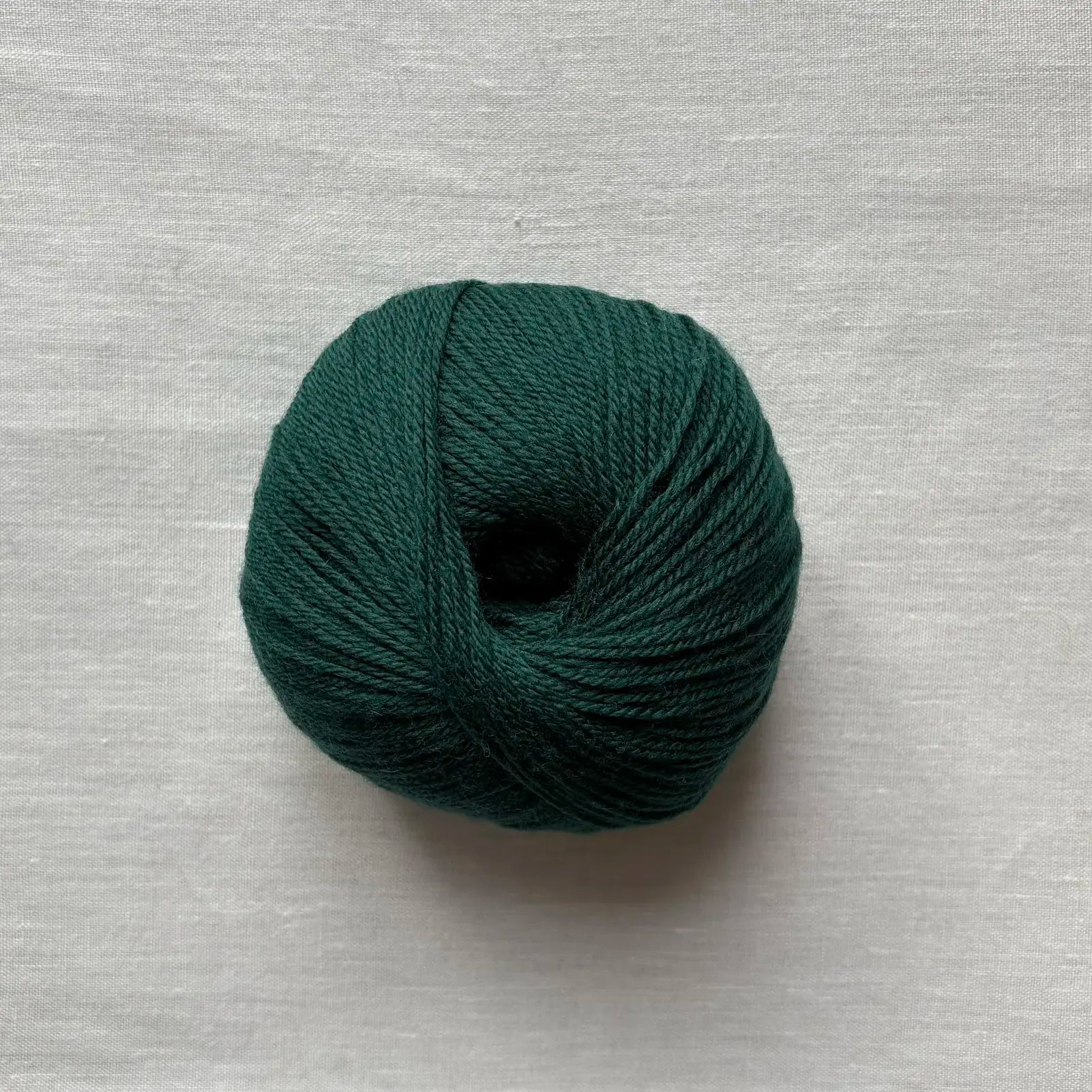 pelote de laine mérinos à tricoter de la marque fonty, de couleur vert anglais
