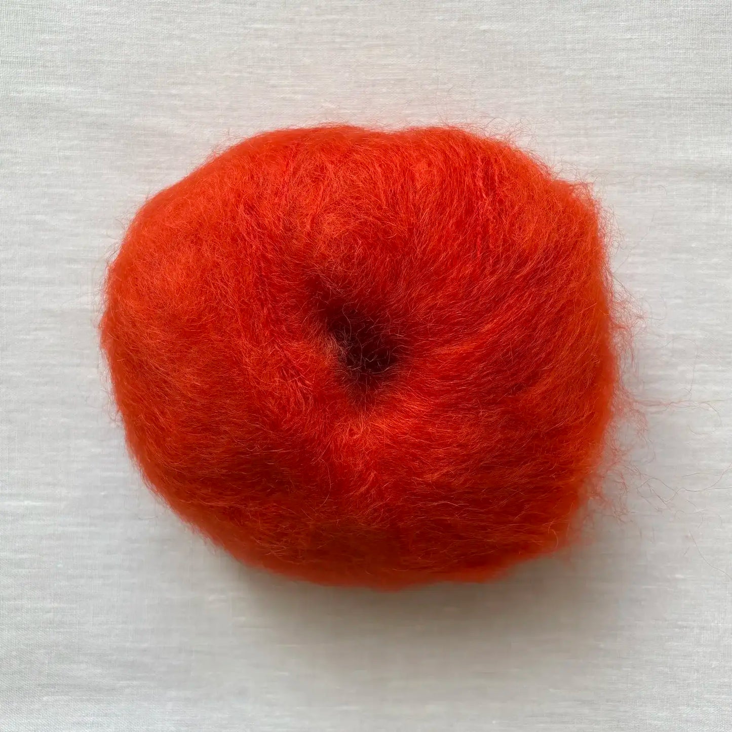 pelote de laine mohair à tricoter de la marque fonty, de couleur orange flamme